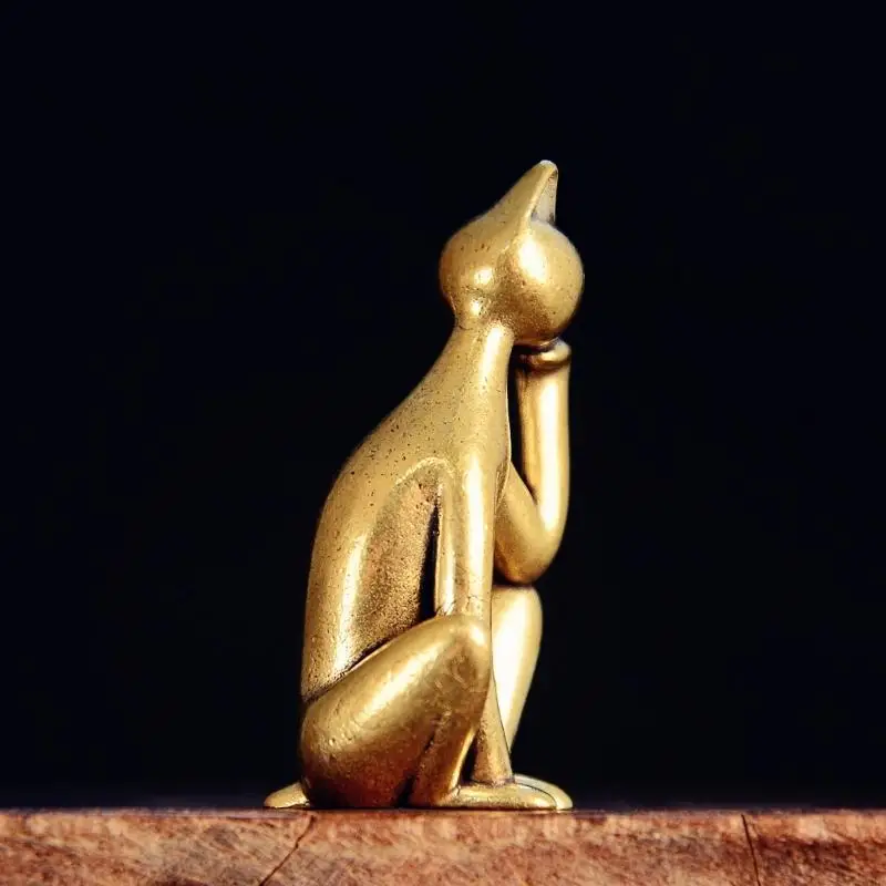 Metal Feline Statue in a Reflective Chin-Resting Pose, Warm Aged-Finish Decorative Accent for Desks, Shelves, and 87HA