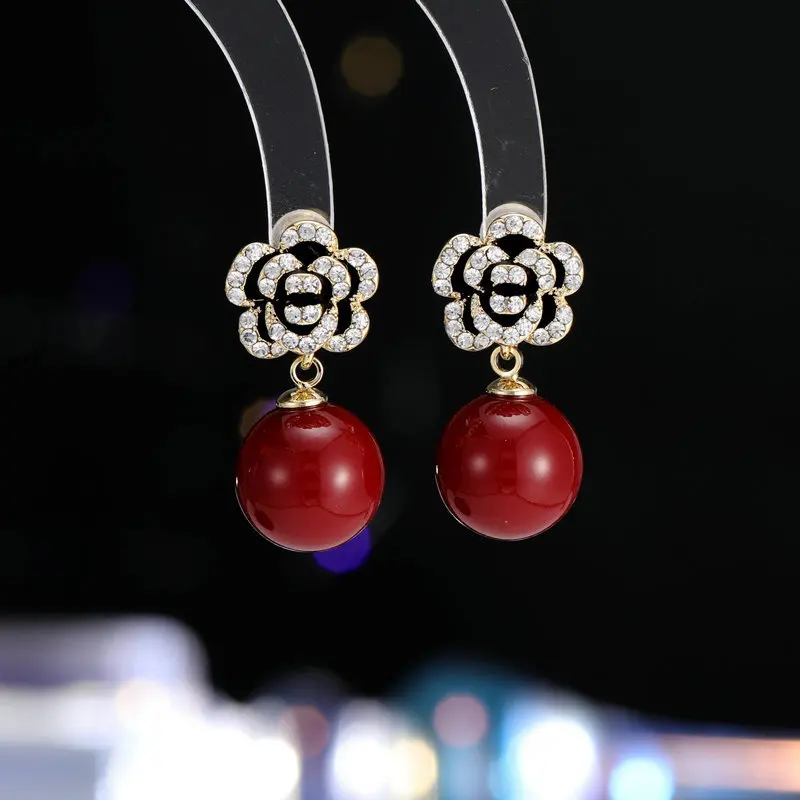 

Camellia pearl earrings, a natural and elegant Ankela red vintage high-end flower autumn and winter earrings