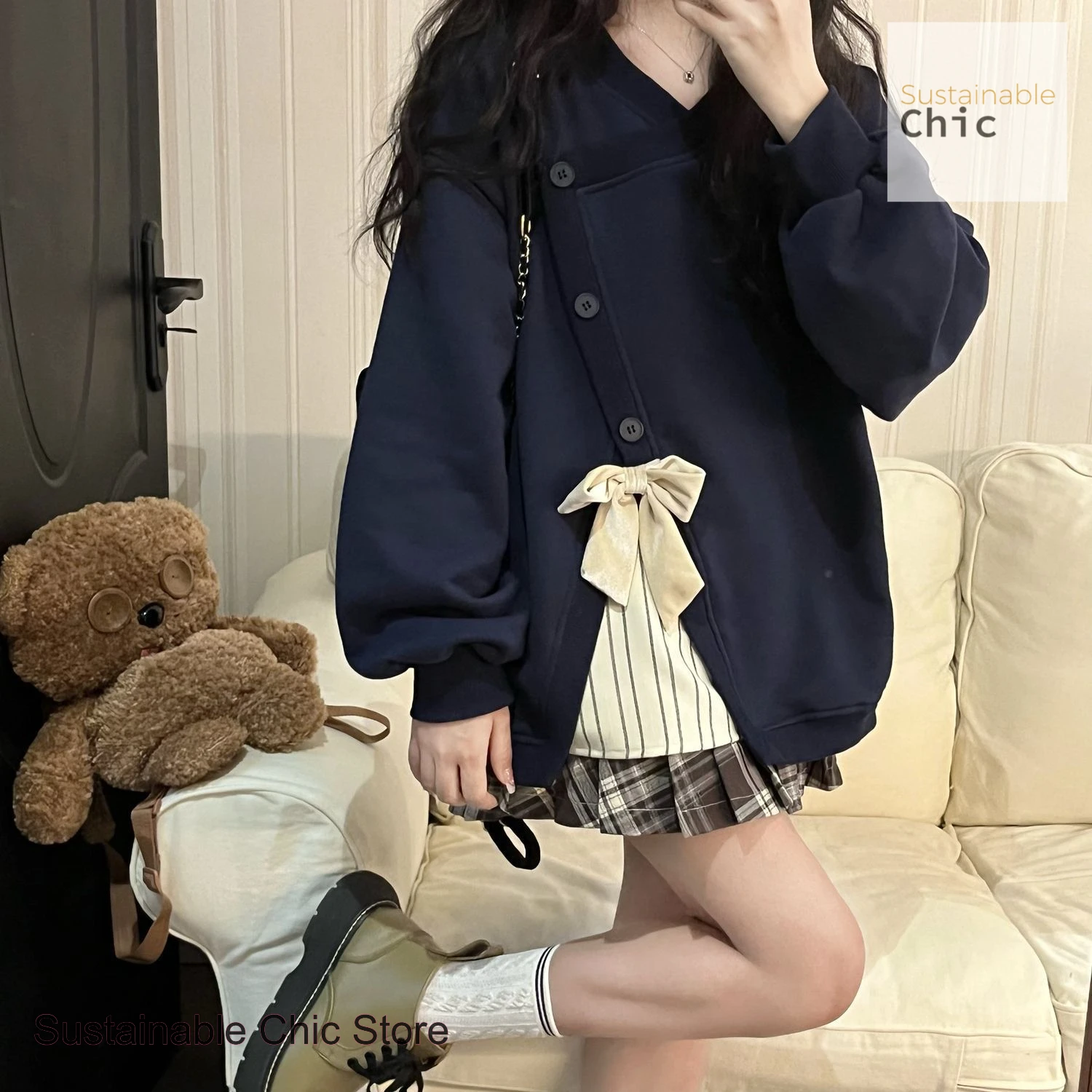 

French style blue plus size irregular stitching sweater women's autumn and winter new loose fashion design casual Joker top.