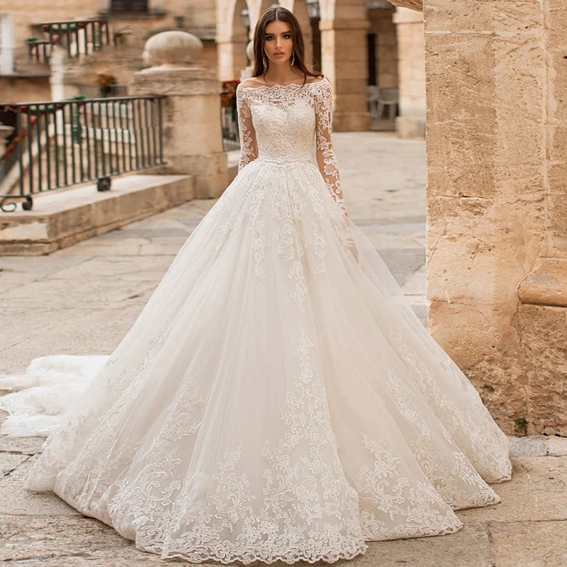 Abiti da sposa Vintage in pizzo francese 2023 scollo a barca maniche lunghe regolari Sweep Train Dubai abiti da sposa arabi matrimonio in chiesa