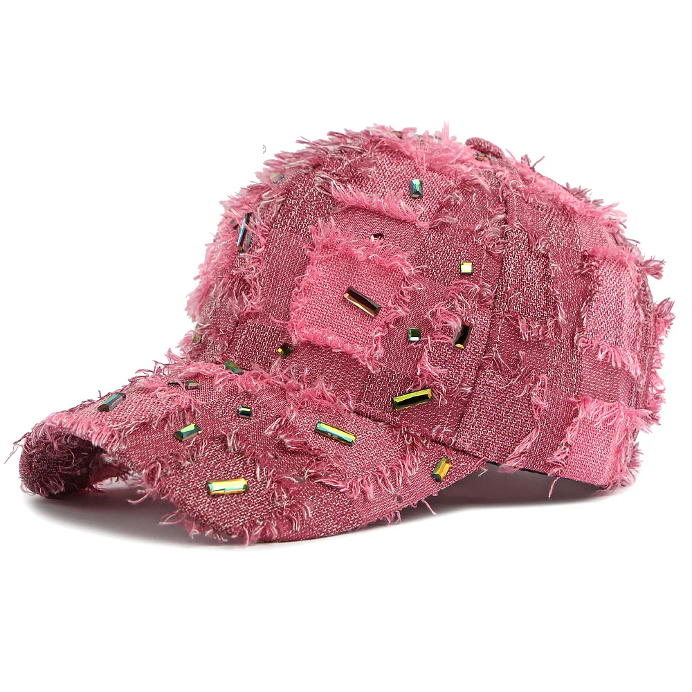 Diva-style with a perforated checked fringed denim baseball cap for shopping, taking photos, and attending music festivals.