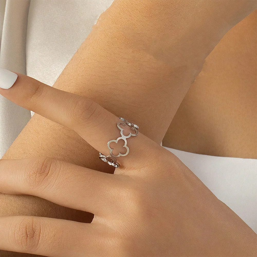 DOTIF Stainless Steel Lucky Hollow Four-Leaf Clover Ring Female Fashion Simple Opening Adjustable Finger Jewelry Party Gifts