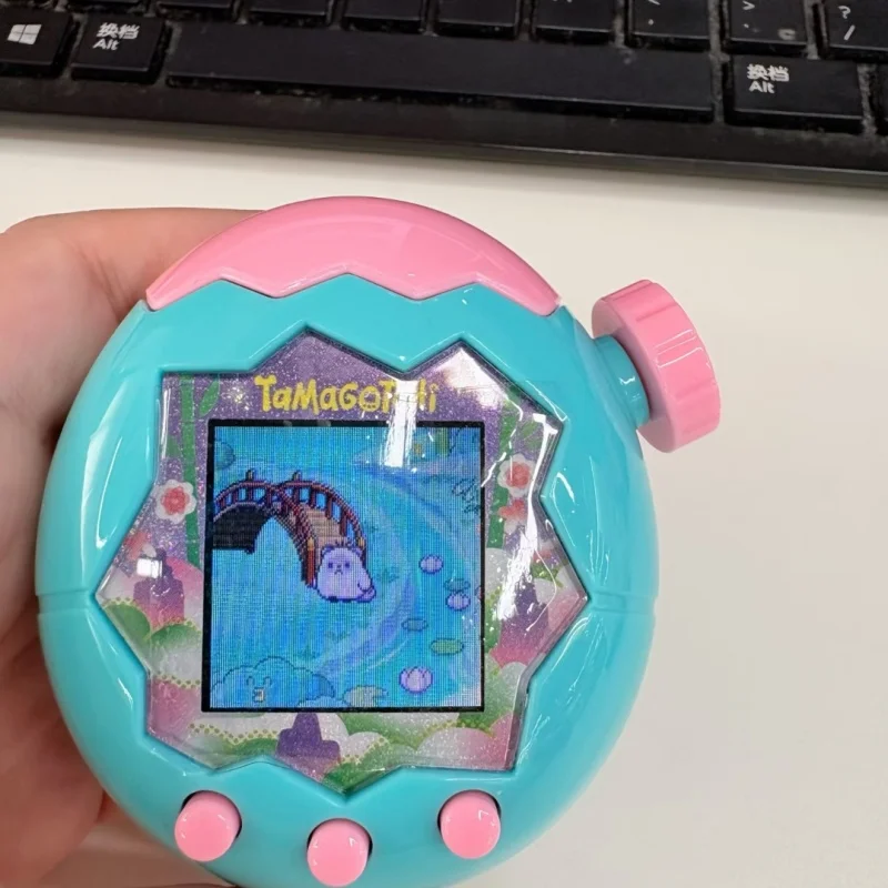 ใหม่แท้จาก Bandai ทามาก็อตจิ ซีรีส์พาราไดซ์ รุ่นป่าเขียว สไตล์มหาสมุทร หน้าจอสี สวนแห่งความสุข ของเล่นเสริมพัฒนาการ ของขวัญ