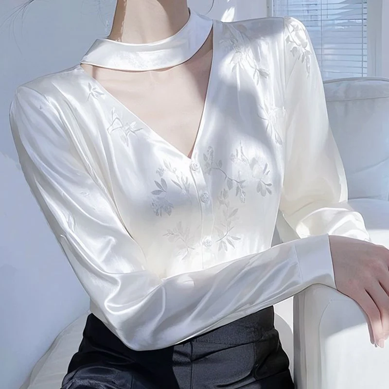 2025 printemps automne nouveau tempérament Jacquard impression couleur unie col rond à manches longues Blouse dames mode évider dessus de chemise