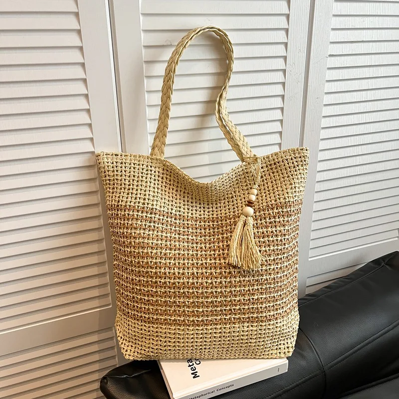 

New Bohemian Woven Shoulder Bag Large Capacity Versatile Beach Bag for Women with Fringe Casual and Minimalist Commuting Bag