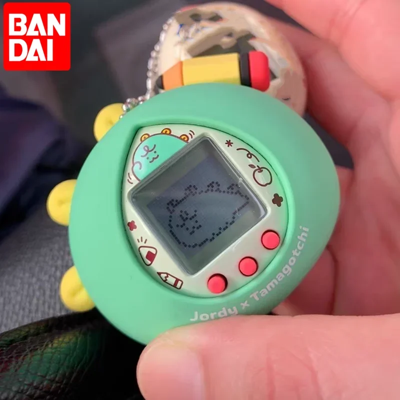 

Original Tamagotchi Bandai Korean Jordy Electronic Pet Machine Game Dinosaur Egg Virtual Nostalgic Game Console Toy Xmas Gift