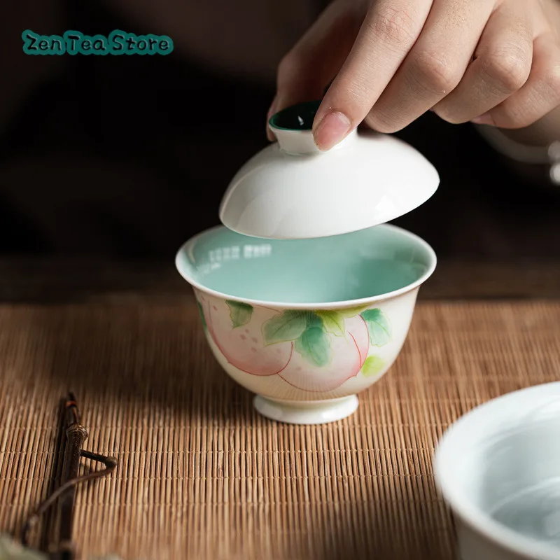 

Hand-painted Peach Jade Mud Cover Bowl Kung Fu Tea Set Underglaze Color Inner Glaze Turquoise Green Domestic Ceramic Tea Bowl