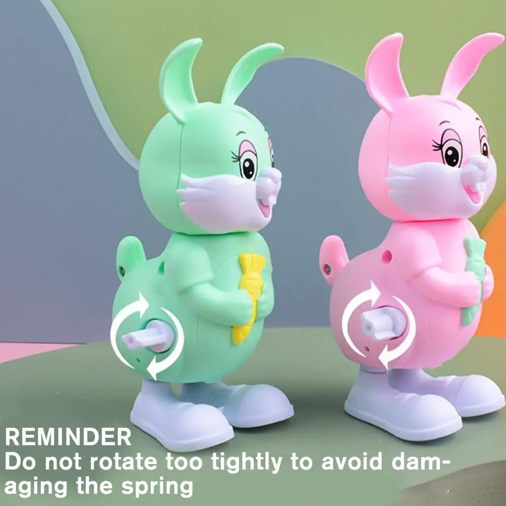 Animowana zabawka królik z kreskówki, nakręcana zabawka mechaniczna, sprężynowa zabawka królik, skaczący i chodzący królik nakręcany.