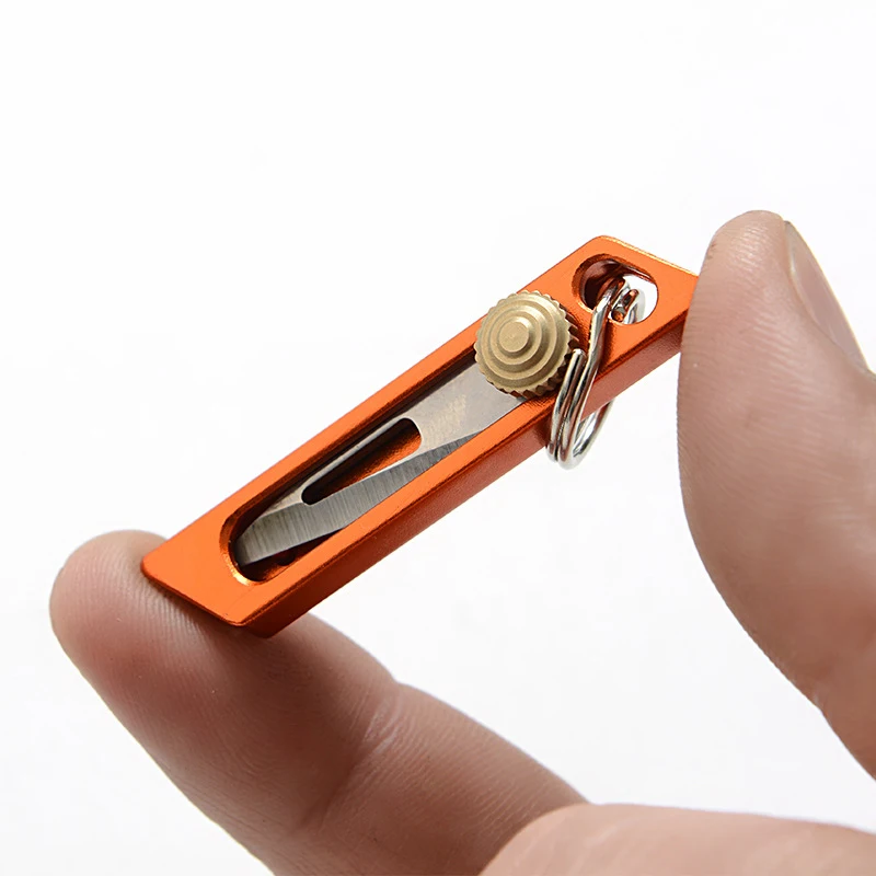 Mini cuchillo de aleación de titanio, pequeño cuchillo afilado de autodefensa, llavero colgante, Gadget portátil, artefacto de desembalaje exprés