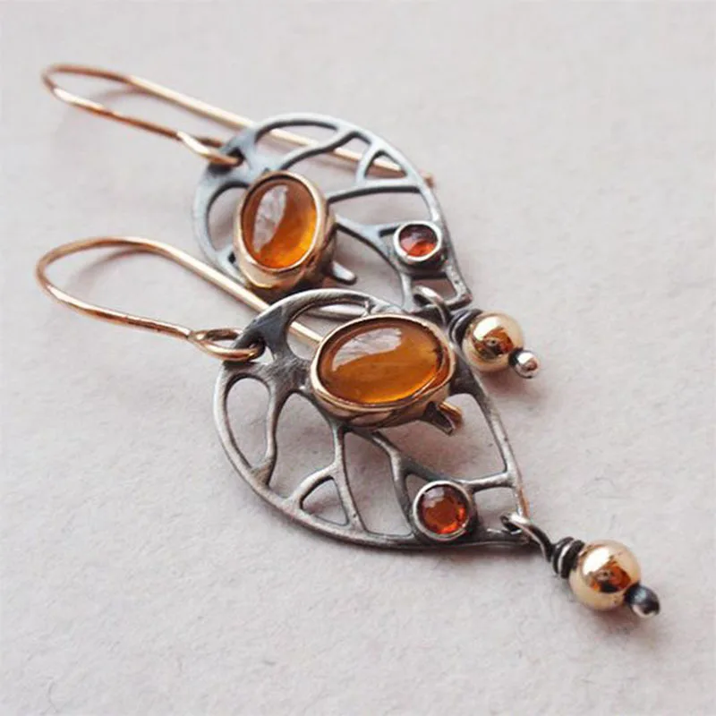 1 Paar Zigeuner Retro alte alte versilberte hohle Metall orange gelb Stein baumeln Ohrringe für Frauen Schmuck