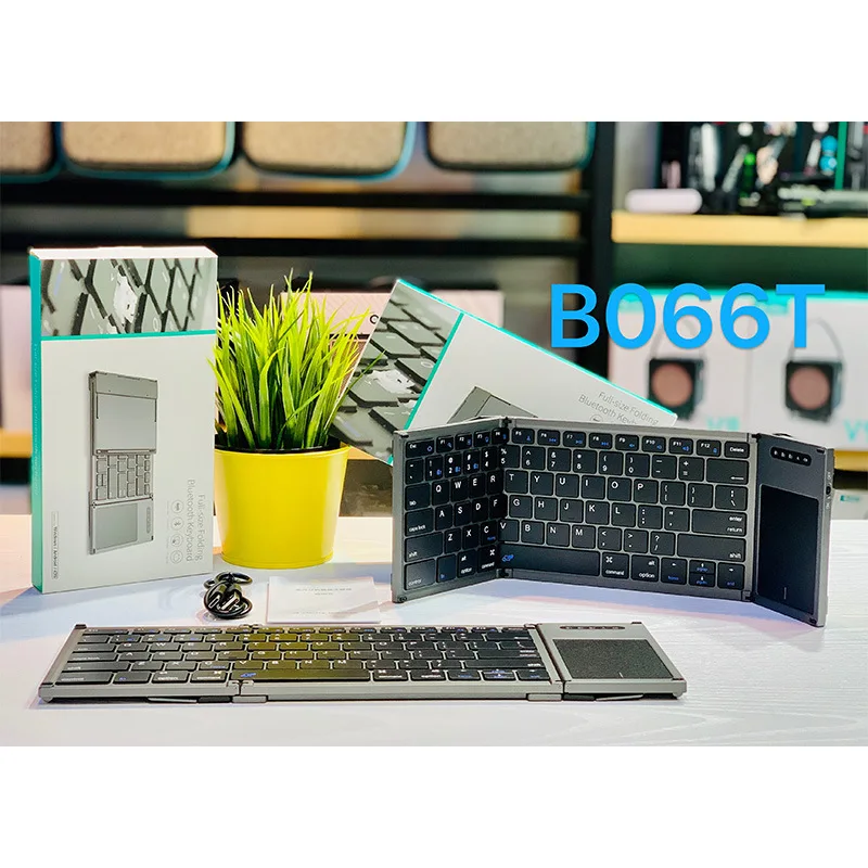 

B066 mobile phone tablet Android triple fold seamless splicing keyboard ultra-thin mini wireless triple fold Bluetooth keyboard