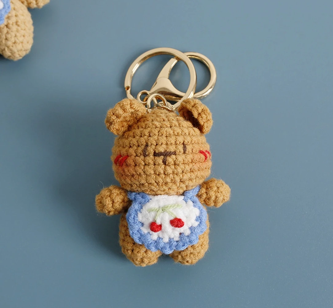 

DIY crocheted bib butter bear doll handmade wool knitting material bag keychain pendant bear gift