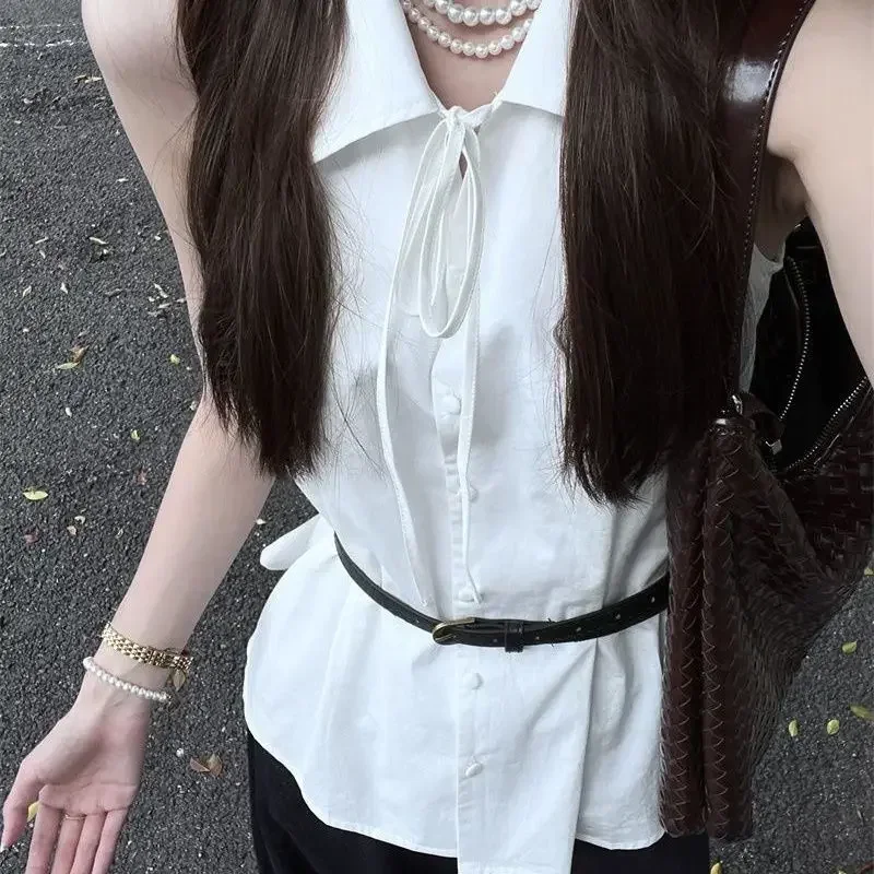 Camisa blanca básica sin mangas para mujer, blusas con cordones a la moda coreana con botones y cuello vuelto, blusas holgadas informales de verano