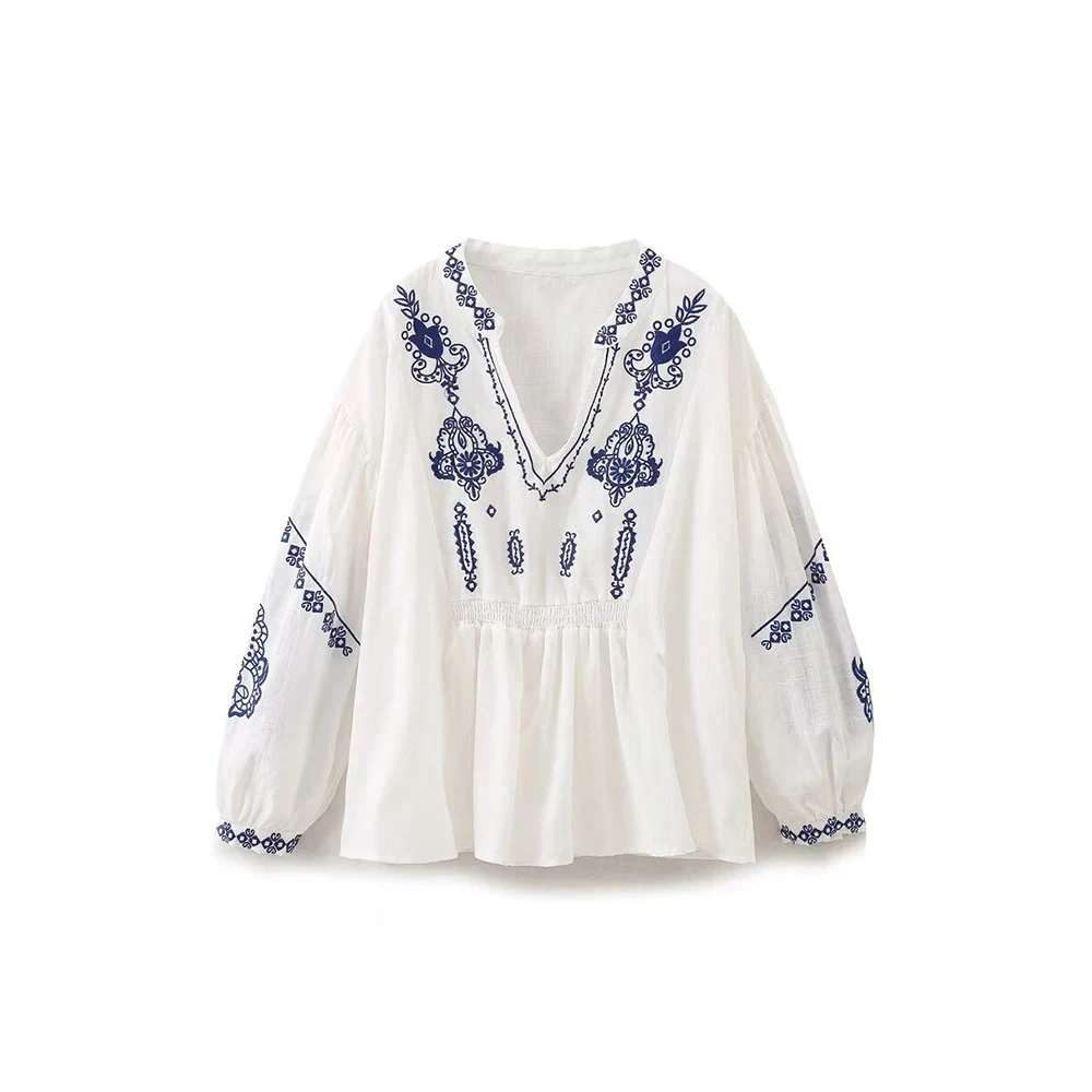 

женщин этнический стиль вышивка литературный длинный рукав рубашка темперамент V-образным вырезом женская мода свободные пеплум рубашка ретро цветочные вышивка рубашка