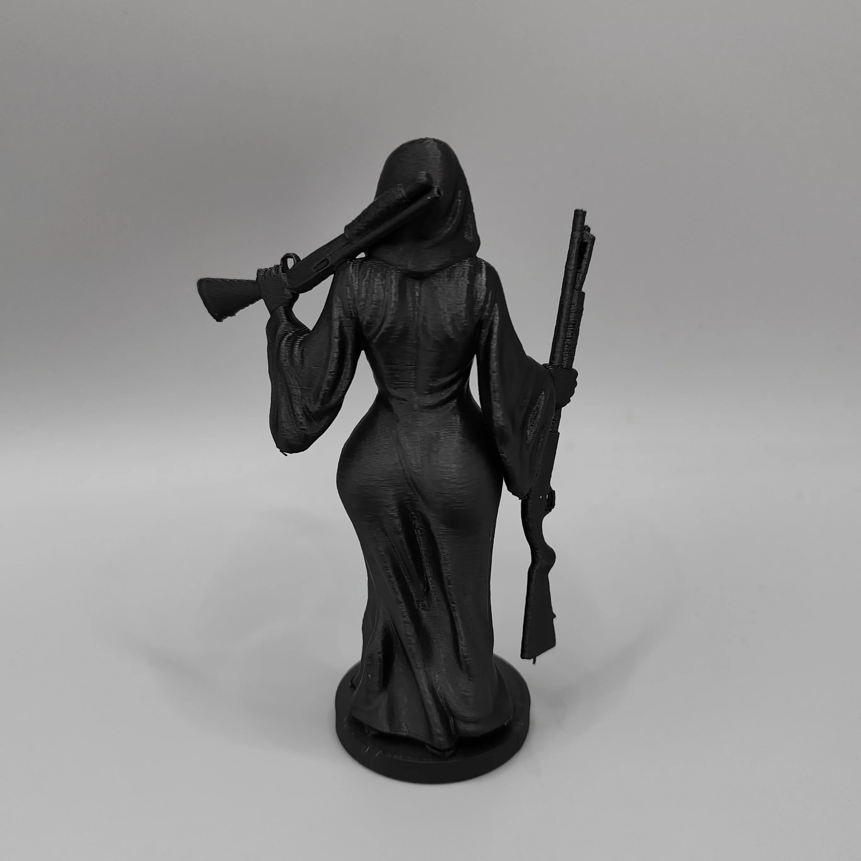 Faceless Hooded Female Hunter With Double Shotguns 3D Printed Decor Figurine