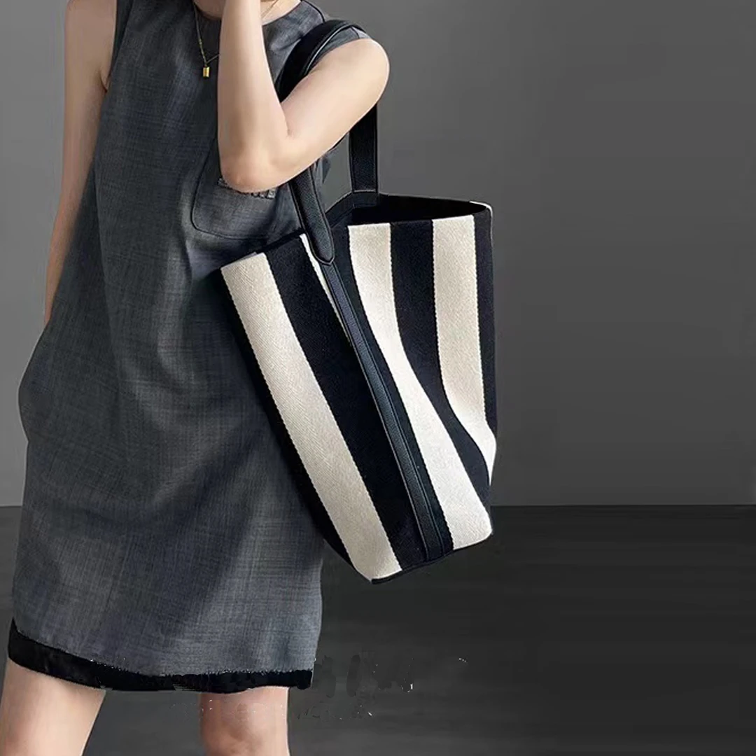 

Striped canvas tote bag 2025 new black and white clash color women's strap women's bag handbag large capacity commuting shoulde