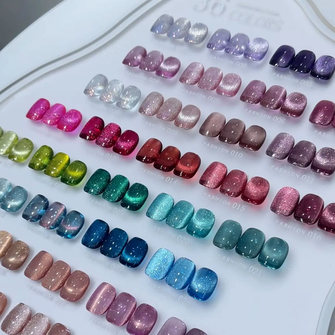 Salon style nails created with crystal cat eye gel polish