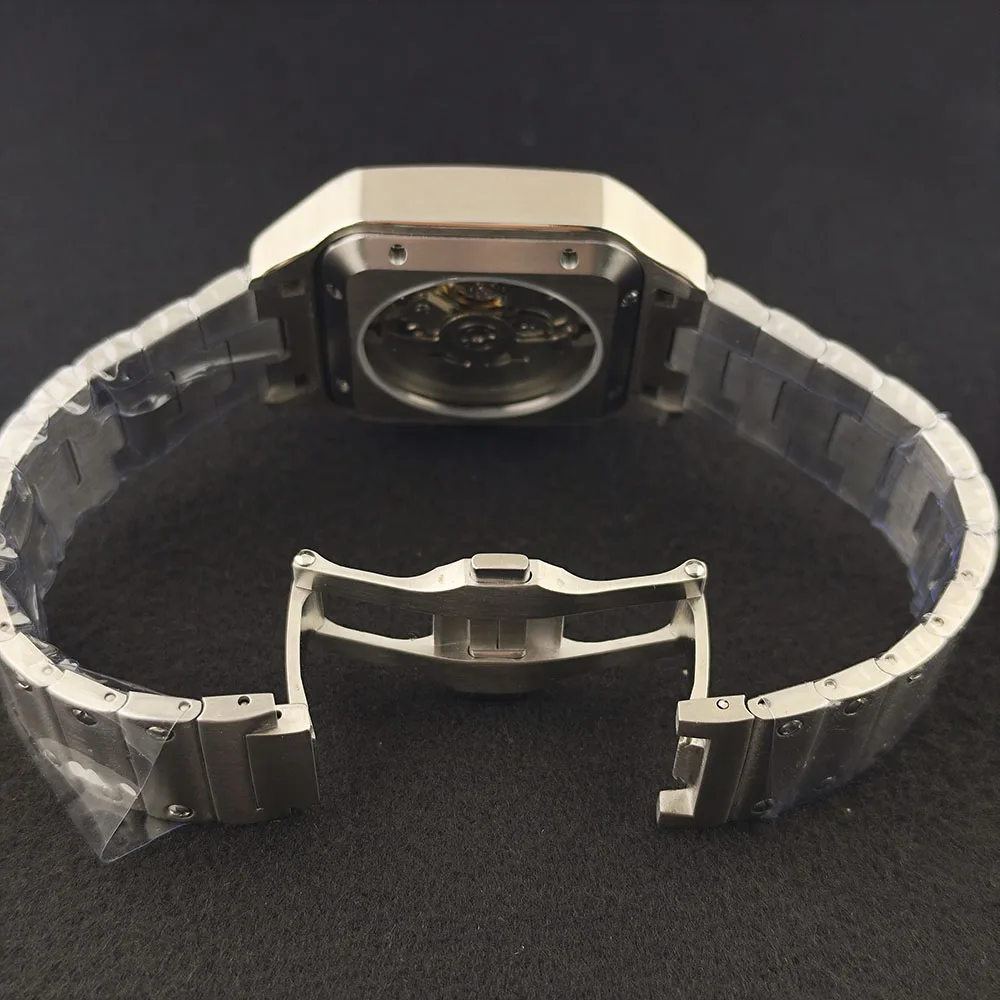 ساعة NH70 جديدة مربعة للرجال من الفولاذ المقاوم للصدأ ساعة ميكانيكية أوتوماتيكية بقرص مجوف NH70 حركة زجاج الياقوت