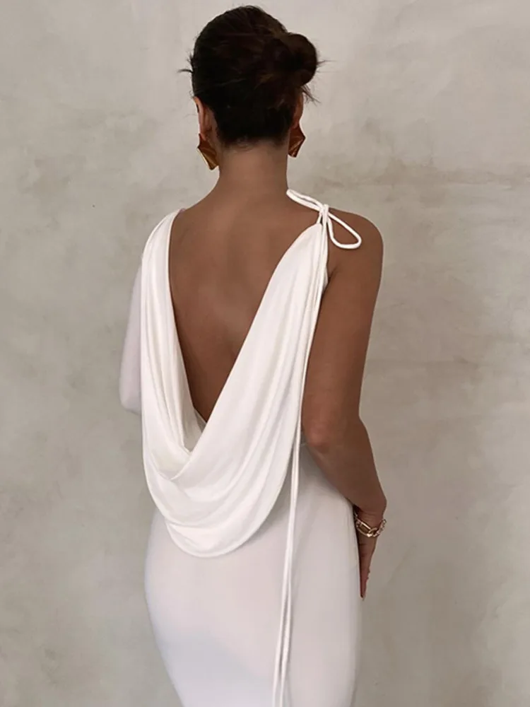 Girl With Back Pose: How This Backless Maxi Dress Transformed My Evening  Look Without Compromising Comfort or Confidence
