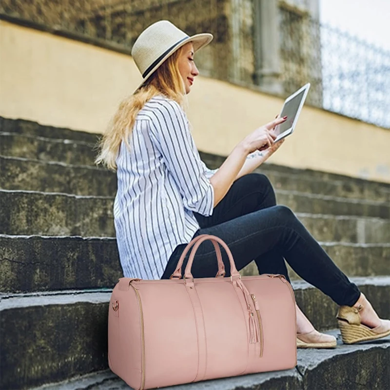 Bolsa de ropa de cuero PU con letras personalizadas para mujer, bolso de traje plegable de Pu de gran tamaño para viaje