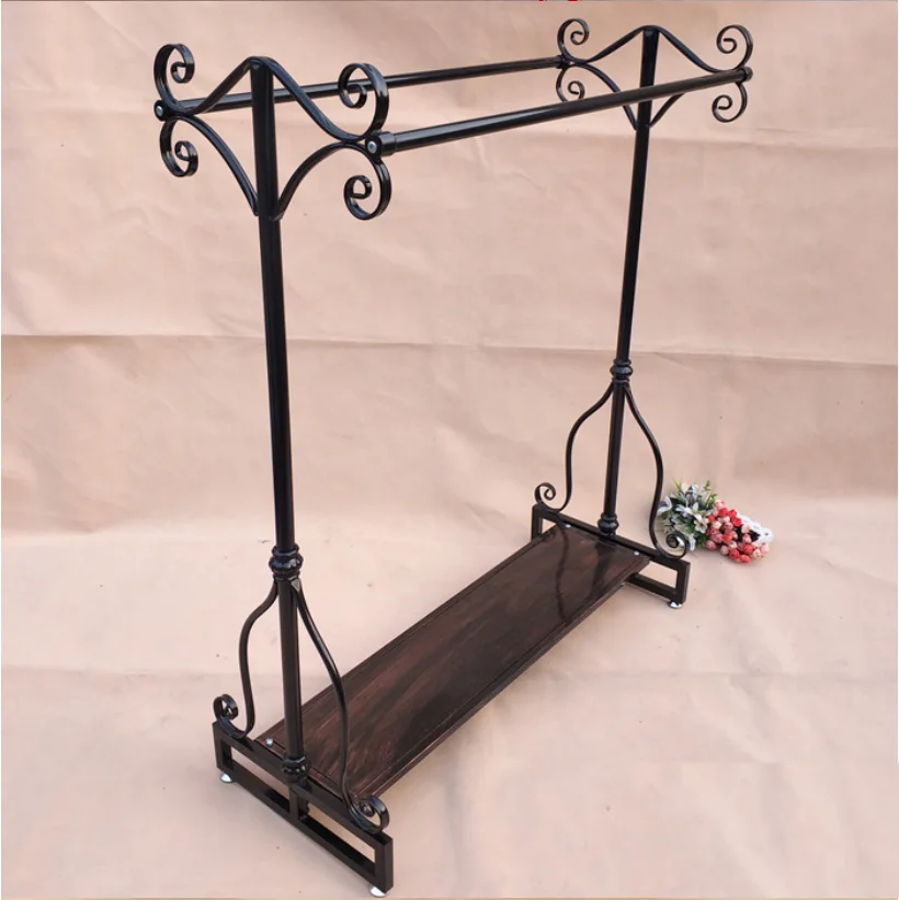 

Island rack in Tieyi clothing store display rack Double row floor type clothes rack for boys and girls