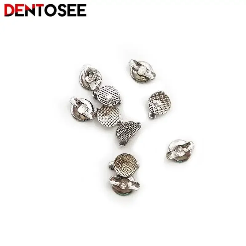 10Pcs/pack Dental Metal Tongue Side Buckle Orthodontic Lingual Button Bottom Bondable Double Wings Dentistry Materials