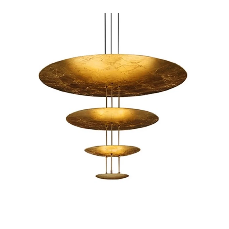 

Italian gold foil villa living room with high designer dining room chandelier