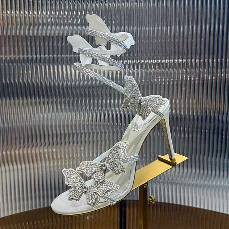 Sandali da donna con cinturino elastico a forma di serpente alla caviglia Sandali con tacco alto sottili Sandali con decorazioni a farfalla con strass Scarpe da festa estive