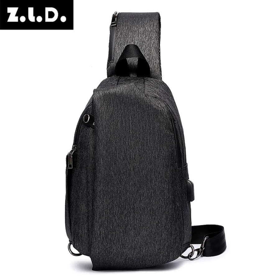 Close-up of the adjustable shoulder strap and durable stitching on the laptop messenger bag