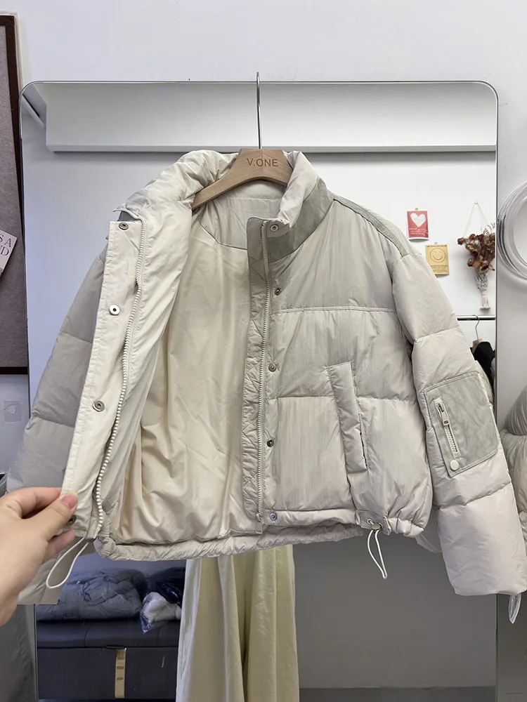 Moda de inverno nova jaqueta feminina commuter emenda gola versátil pato branco para baixo estilo curto jaqueta