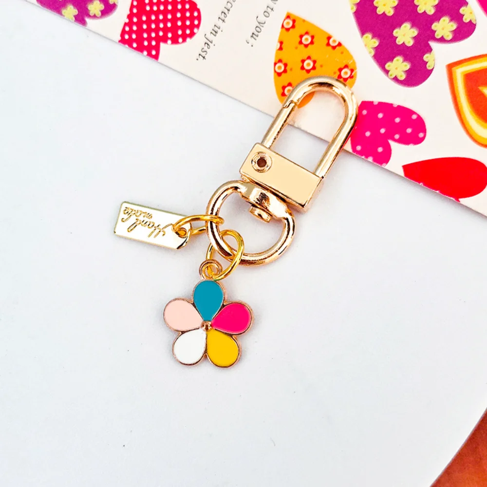 

Fashion Korean Ins Small Daisy Flower Keychain Pink White Black Enamel Metal Keyring Pendant Women Key Bag Jewelry Accessories