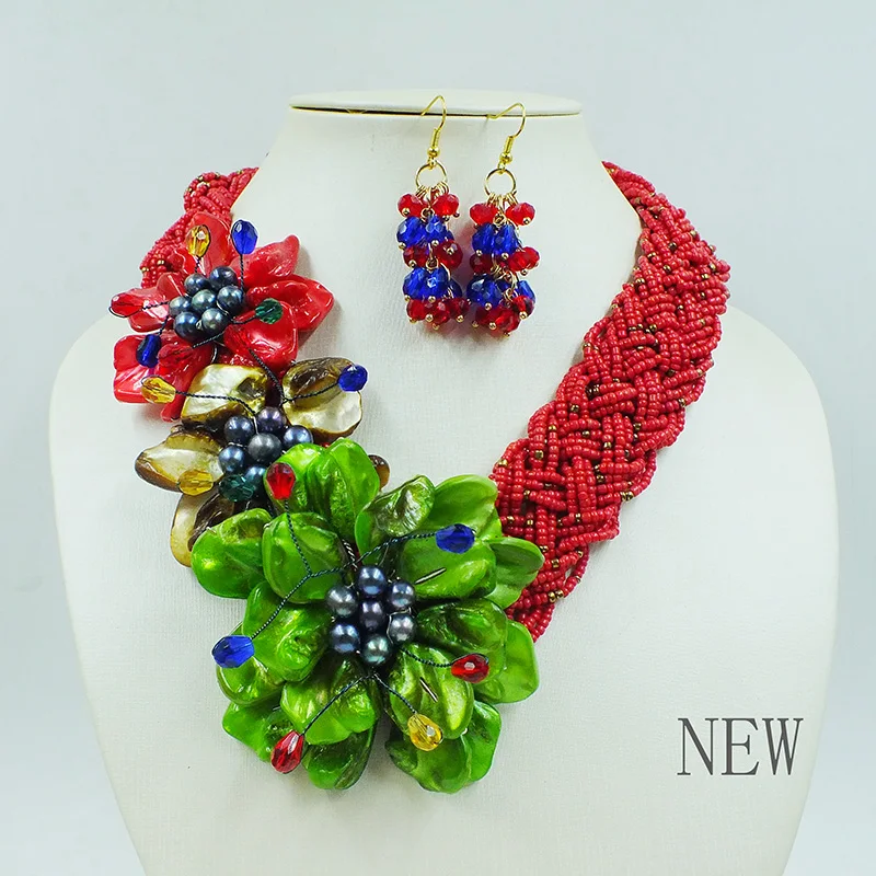 Classic women's party necklace and earring set. Handmade woven shell flower jewelry 19”