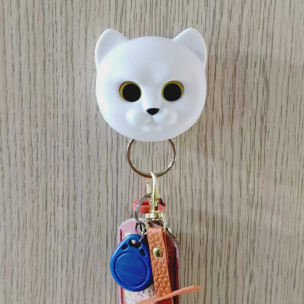 

Creative, simple, and handy small gift that blinks, pet cat shaped, strong magnetic key holder