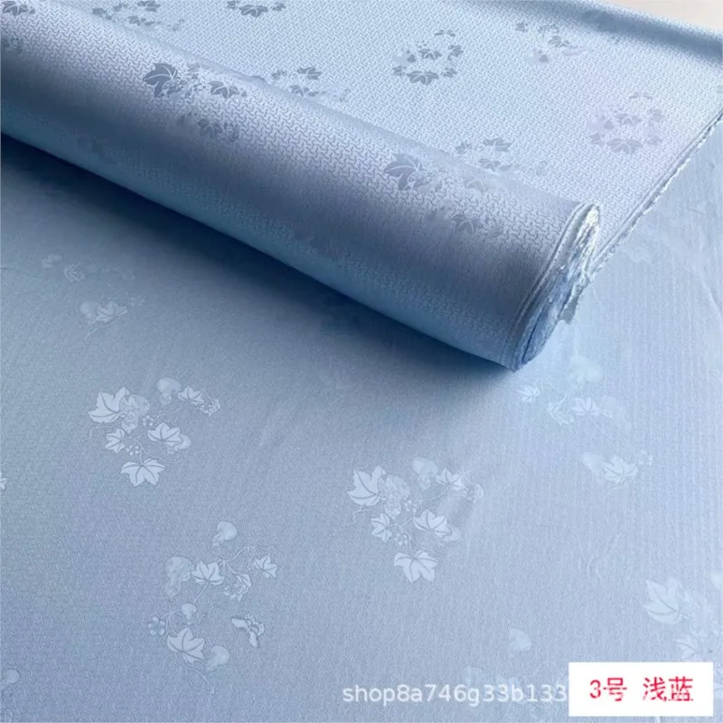 ชุดกี่เพ้าผ้าไหมลายฉลุแบบโปร่งสำหรับฤดูร้อน