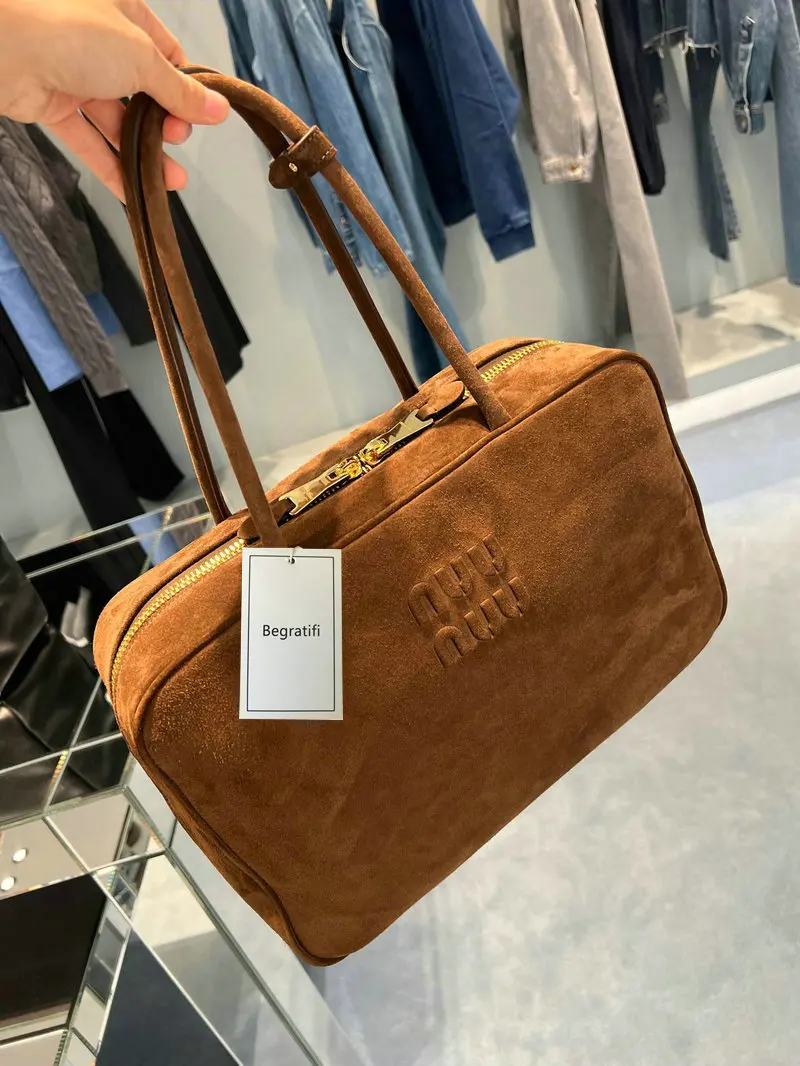 Bolso de mano de piel auténtica para mujer, bolsa de viaje de un solo hombro, estilo Retro, de diseñador de lujo, para otoño e invierno, novedad de