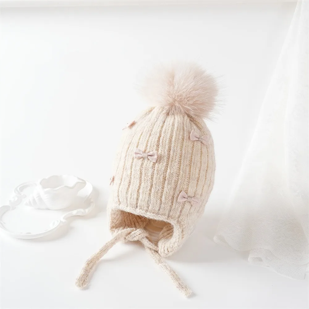 

Cute Pompom Bows Children Winter Hat Ears Protection Fleece-lined Girl Cap Thicken Ears Protection Hat Autumn