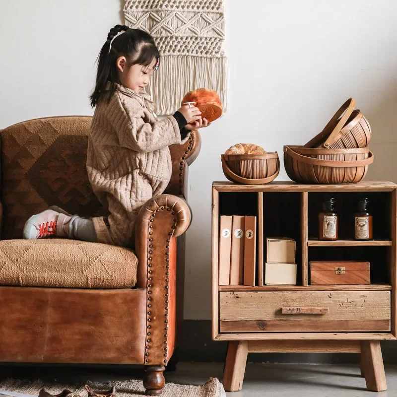 Logs, literature and art, four squares, one bucket magazine cabinet, old pine