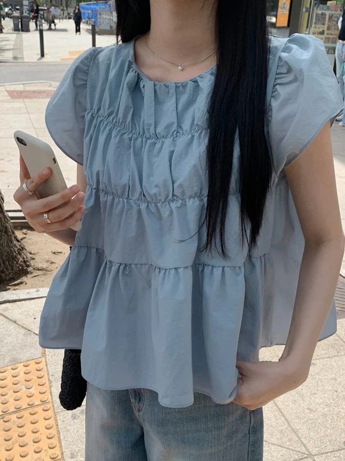 เสื้อทรงหลวมสไตล์เกาหลี สีขาวหวาน ดีไซน์จีบระบาย สำหรับผู้หญิง ใส่ได้หลายโอกาส เหมาะกับฤดูร้อน ทรงบับเบิ้ล
