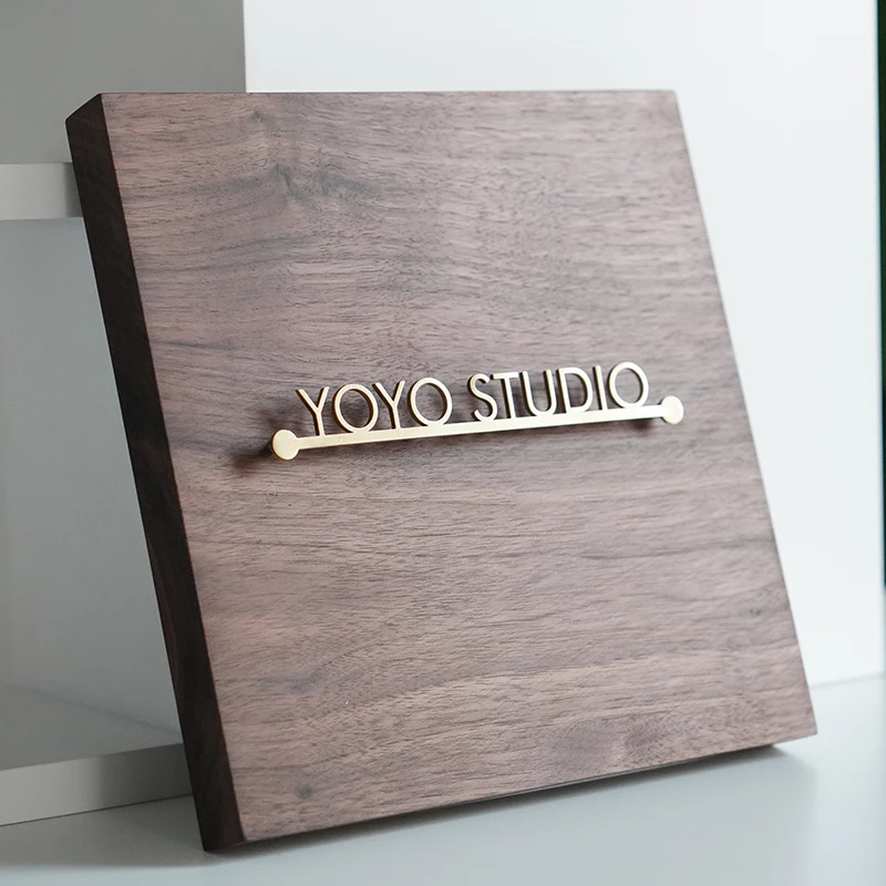 

Solid wood door brand Customized walnut floating character signboard Stainless steel character company listed brass private room