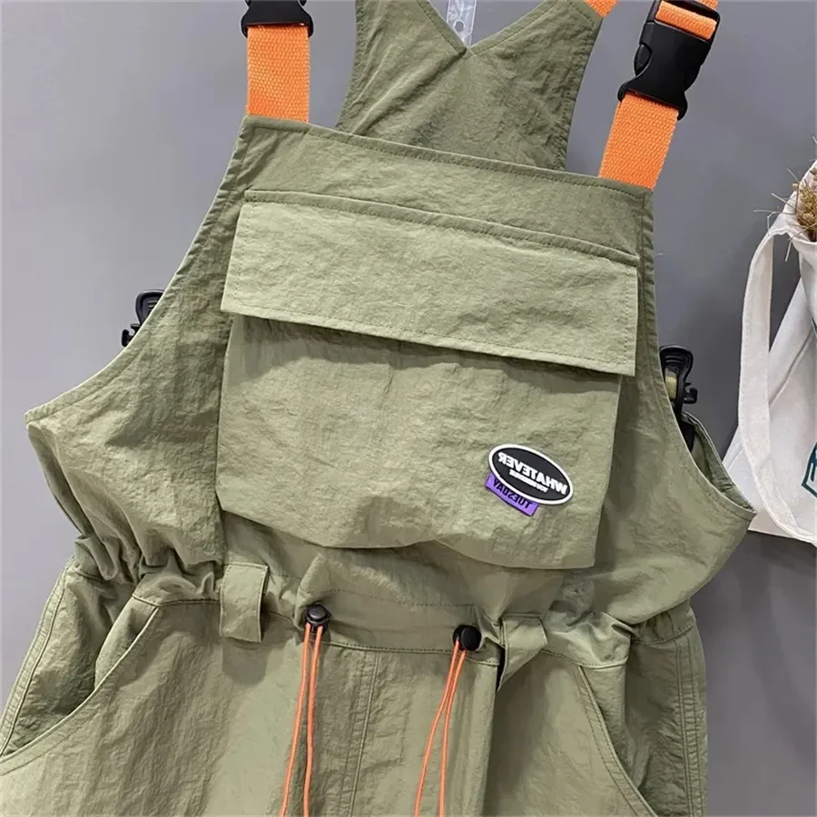 SALIENCY 2025 여름 오버롤 일본식 루즈 스트랩 캐주얼 포켓 드로스트링 허리 와이드 레그 롤드 헴 점프수트 쇼츠