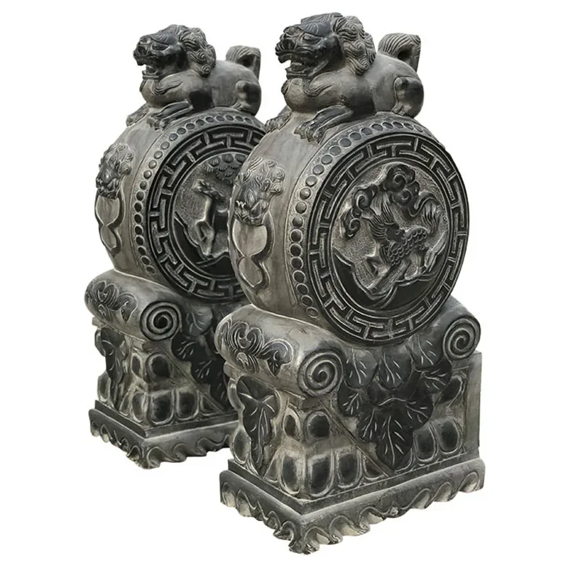 

Stone carved door piers with drum shaped stones, a pair of antique blue stones, door to door decorations