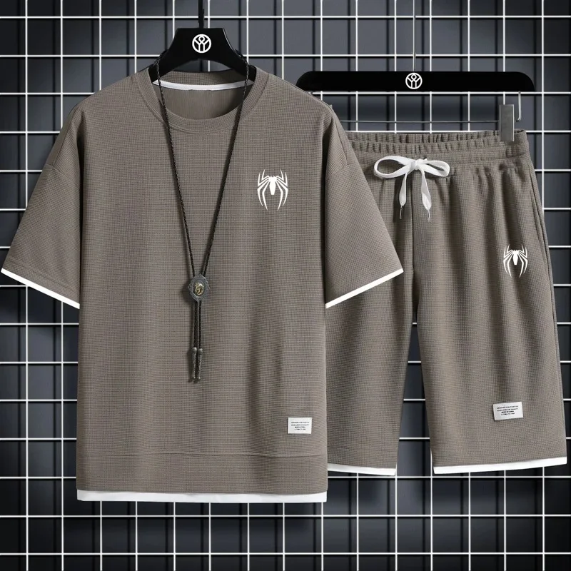 

2024 New Summer Men's Fashion Fashion Fashion Brand Casual Sports Set Round Neck Loose Short sleeved Shorts Waffle Two Piece Set