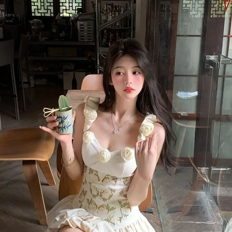 Abiti da donna al ginocchio 2025 Donna senza maniche Prospettiva trasparente trasparente scavato scavato traforato ritaglio cut-out