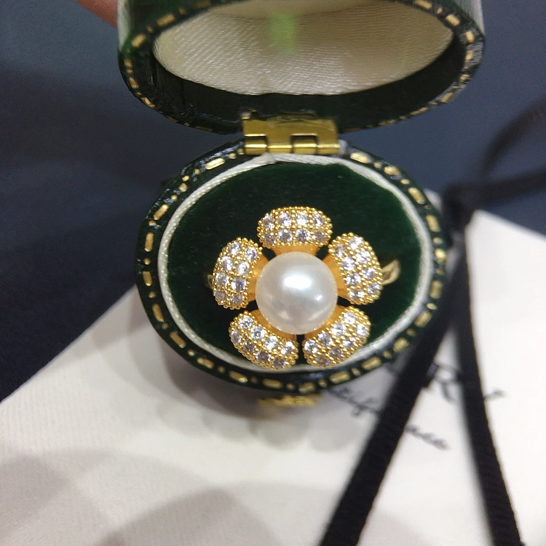 

Natural freshwater pearl ring with a light luxury and high-end feel. Sunflower micro inlaid zircon pearl ring bracelet