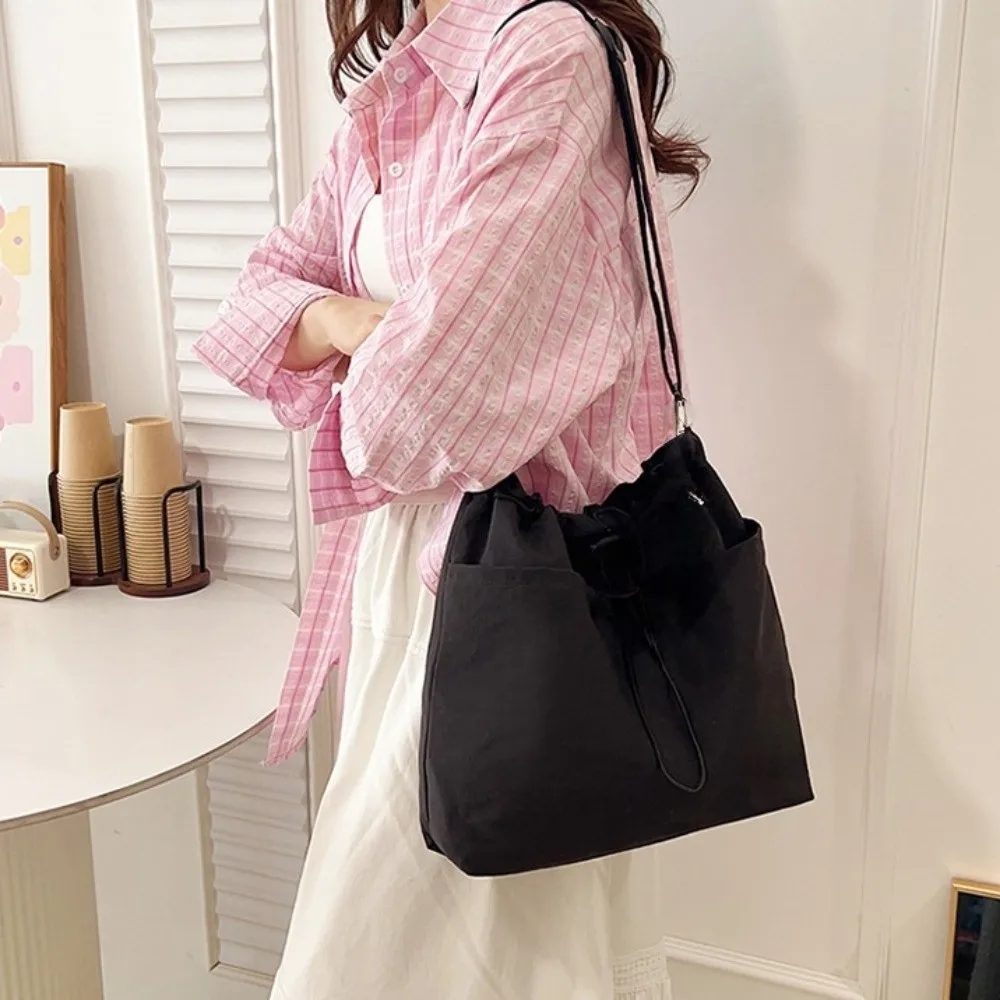 

Simple Nylon Wrinkle Drawstring Bag Korean Style Large Capacity Crossbody Bag Waterproof Commute Single Shoulder Bag Unisex