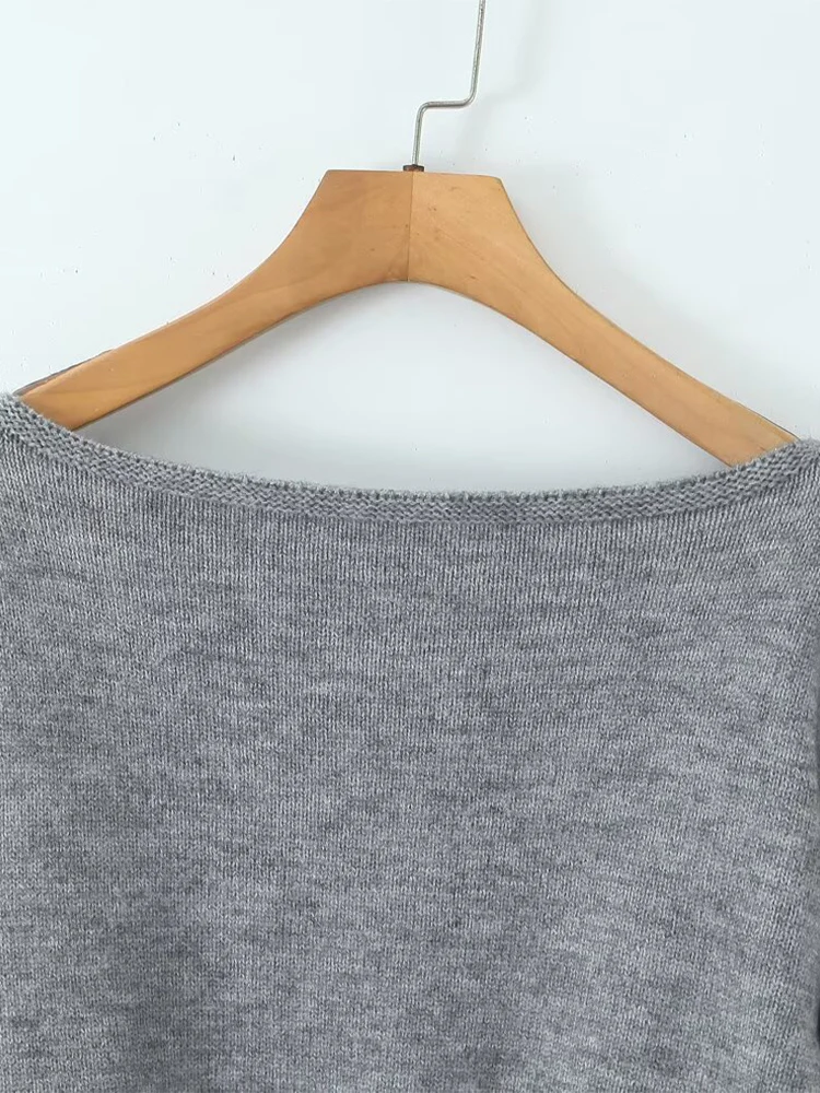 Jesienny nowy damski sweter w stylu francuskim retro, prosty, modny, z długim rękawem, seksowny, z odkrytym ramieniem lub bez ramiączek.