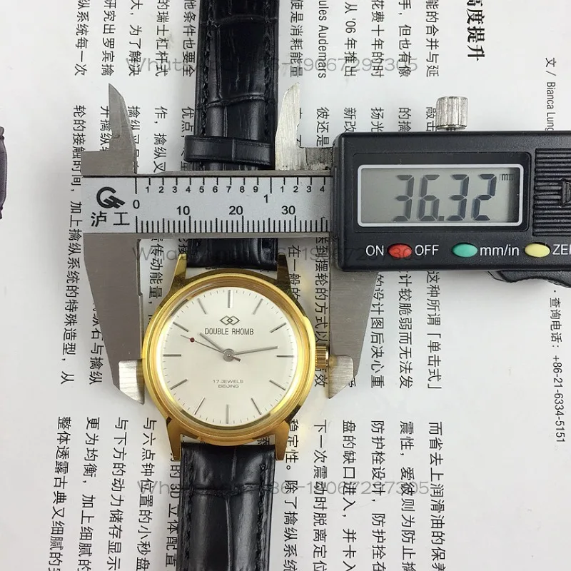 

Perfect Time Watch Stor Shuangling Brand, Yellow Shell Strip Nails, White Surface, Manual Mechanical Watch Diameter 35mm
