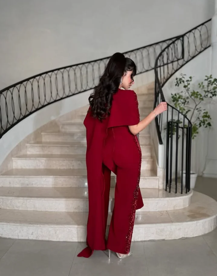 Burgundy Sparkly Jumpsuit Prom Dresses with Cape Applique Feather Saudi Customized Jersey Evening Gown Pant Suit Outfit
