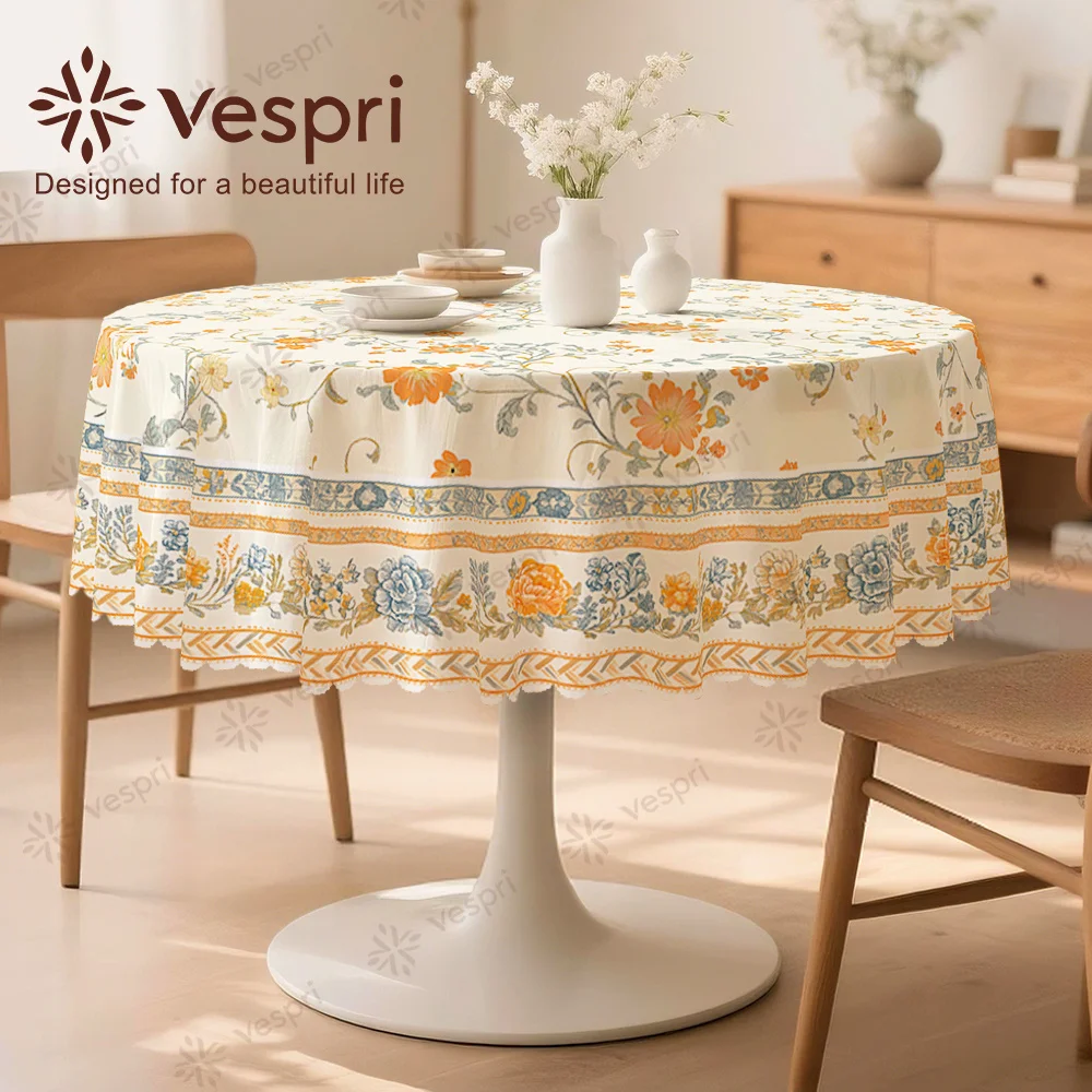 Vespri Spring Tablecloth, with yellow and white decorations, featuring flowers.zyc