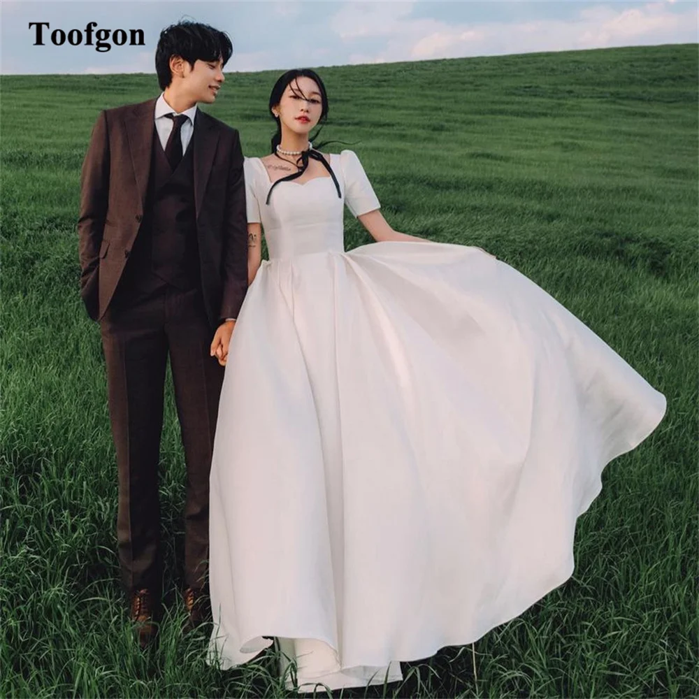 

Toofgon A Line Satin Korea Wedding Dresses Short Sleeves Bridal Wedding Photos Shoot Gowns Floor Length Long Formal Party Bride